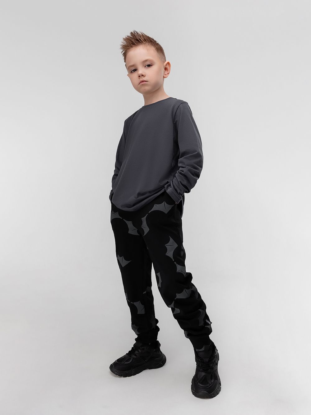 Брюки - джогерры с набивкой - фото 1