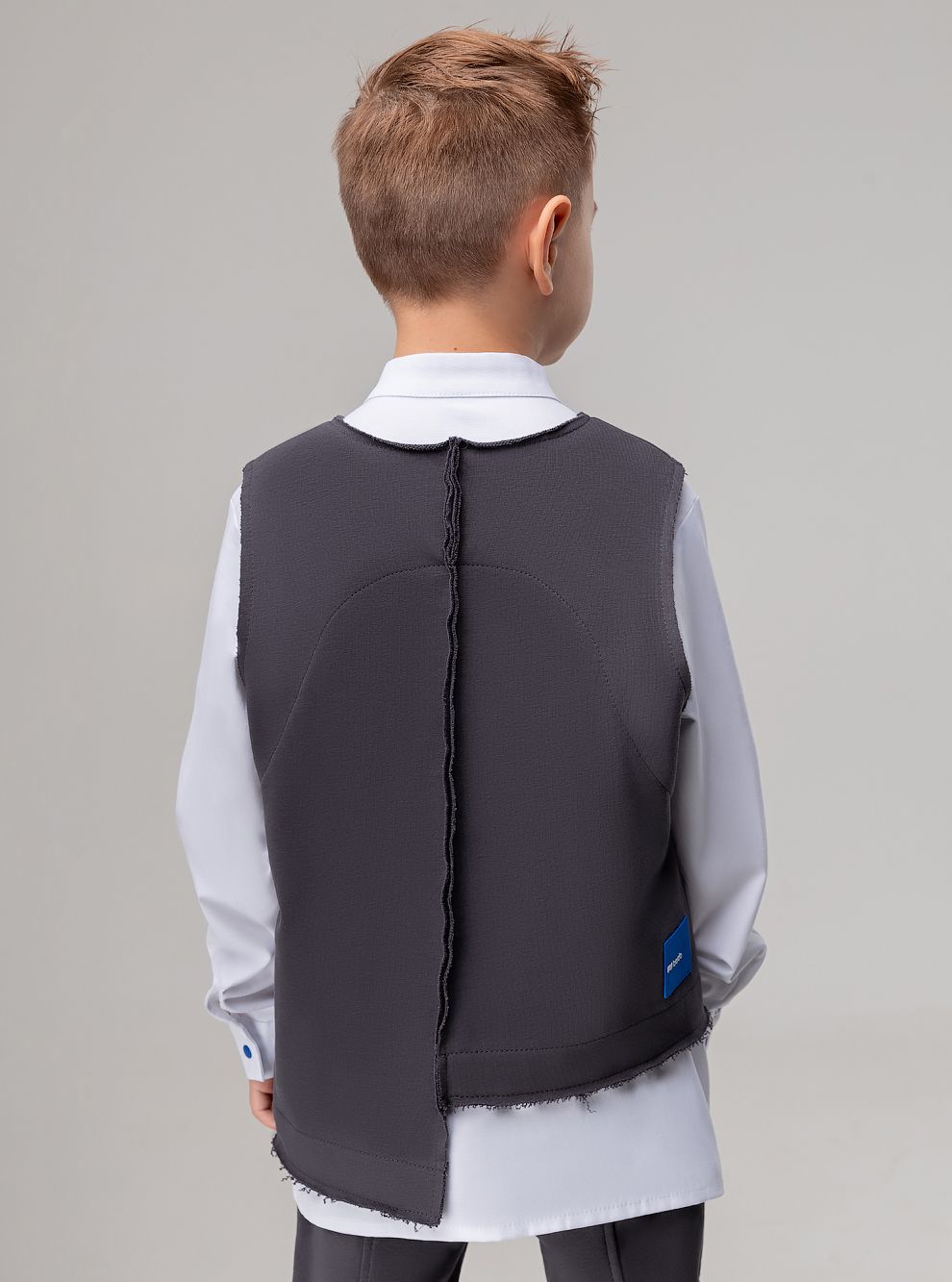 Жилет ассимитричный на кнопках - фото 5